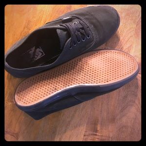 Black low rise VANS skate shoes